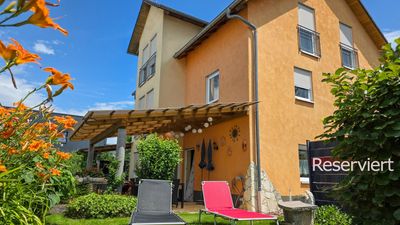 Außergewöhnliches Wohn- und Geschäftshaus mit mediterranem Flair