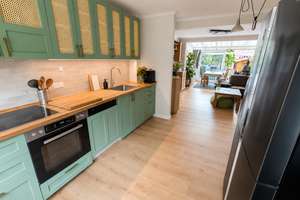 Modernisiertes Reihenmittelhaus mit Garten, Wintergarten und neuer Einbauküche in Kiel-Elmschenhagen