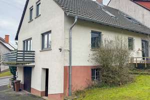 Traumhaftes Zweifamilienhaus mit großem Garten in Bischbrunn – Die vollständige Adresse der Immobilie erhältst du vom Anbieter., 97836 Bischbrunn – Vorschaubild 1
