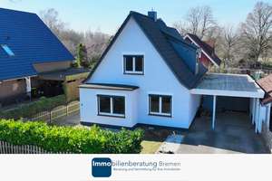 Modernes Einfamilienhaus mit Garten und Carport
