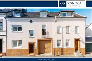 Doppelwohnhaus mit 6 Wohnungen und 3 Garagen im Innenhof in Flittard