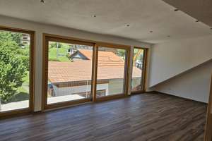 Wohnen mit Charakter: 3-Zimmer-Dachgeschosswohnung in Rettenberg