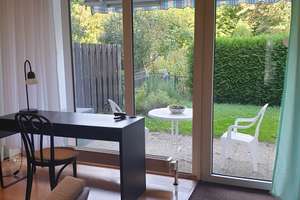 Leben und Arbeiten in Darmstadt: Wohnung mit Garten und guter Verkehrsanbindung