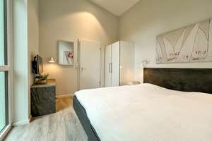 Penthouse Wohnung in einer der beliebten Dünenvillen an der Hafenpromenade am Priwall – Die vollständige Adresse der Immobilie erhältst du vom Anbieter., 23570 Travemünde, Lübeck – Vorschaubild 23