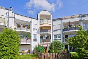 2-Zimmer-Wohnung mit Terrasse, eigenem Garten und TG-Stellplatz