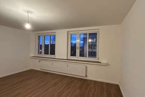 Lebendiges Stadtleben: 2-Zimmer-Wohnung mit Garage
