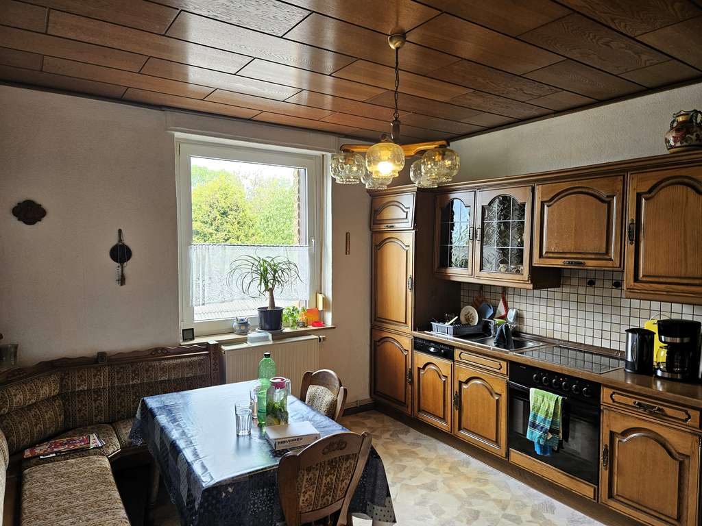 Immobilie in Geseke - Geseke: Mehrfamilienhaus mit modernisierten Wohnungen & Potenzial - Bild 2
