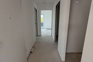 Erstbezug: Moderne 2,5-Zimmer-Dachgeschosswohnung mit zwei Terrassen und Klimaanlage – 64839 Münster – Vorschaubild 4