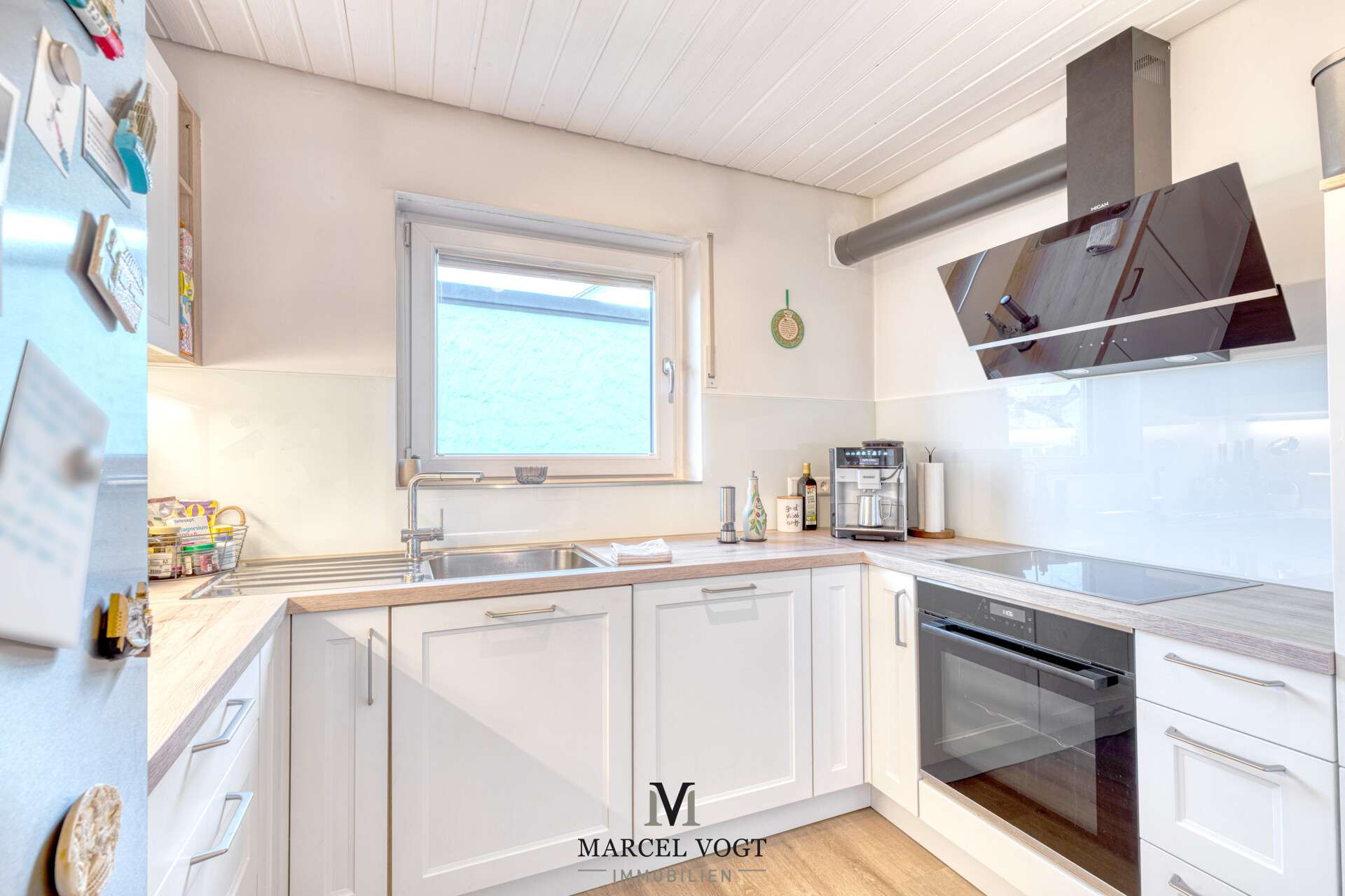 Immobilie in Wolfschlugen - Lichtdurchflutete Erdgeschosswohnung mit Garten & Terrasse – Wohnen auf zwei Ebenen - Bild 2