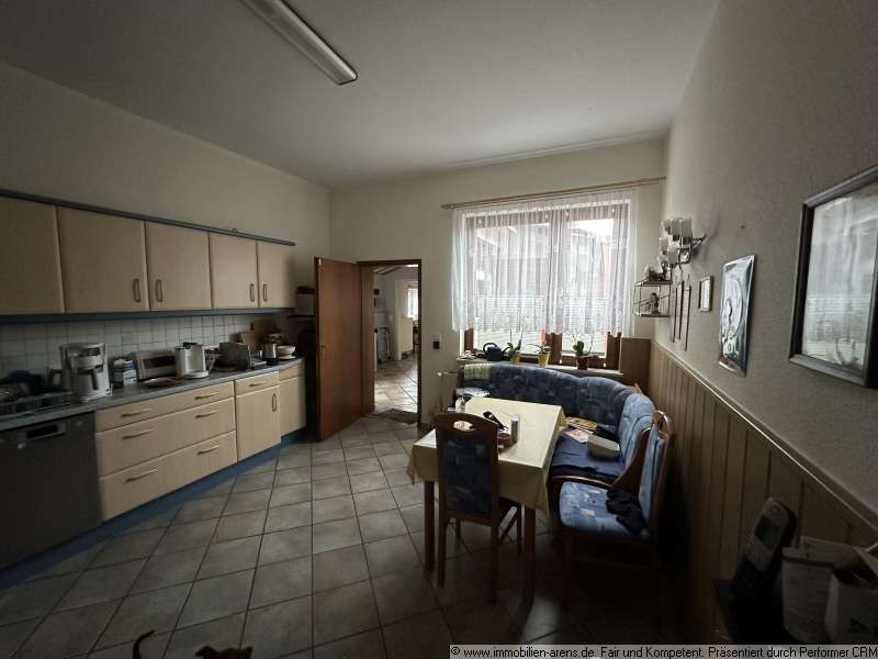 Immobilie in Apen - solides Klinkergebäude mit Garage und Wintergarten in Apen - Bild 3