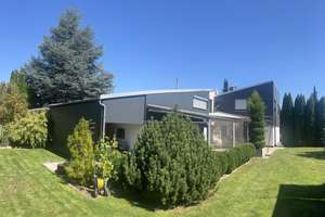 Wohlfühloase:  Architektenhaus mit Gewerbeanteil plus Bungalow  in ruhiger zentraler Lage