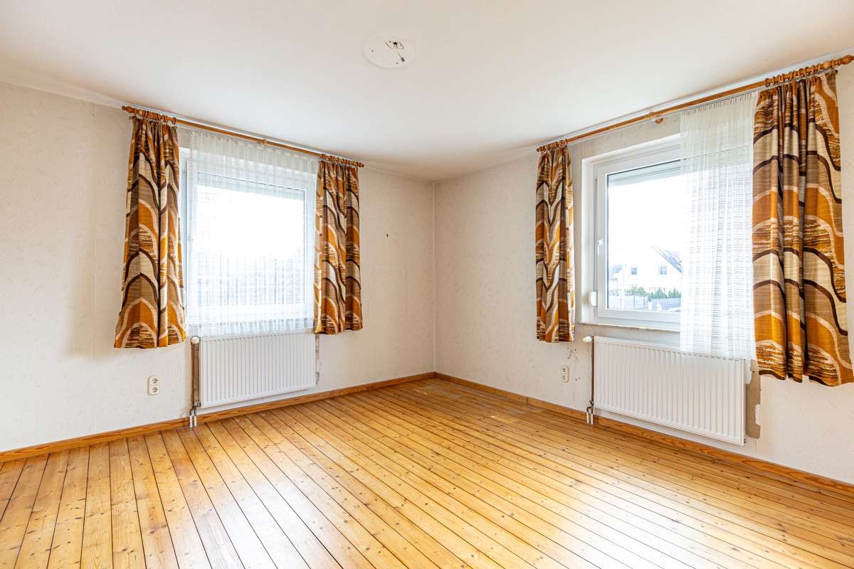 Immobilie in Nordstemmen - Zwei- bis Dreifamilienhaus mit großem Garten in Burgstemmen - Bild 5