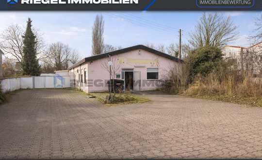 Sie Hier? Wir auch! Ca. 2496 m² Grundstück - vielseitig nutzbarer Bungalow & eine Gewerbeeinheit