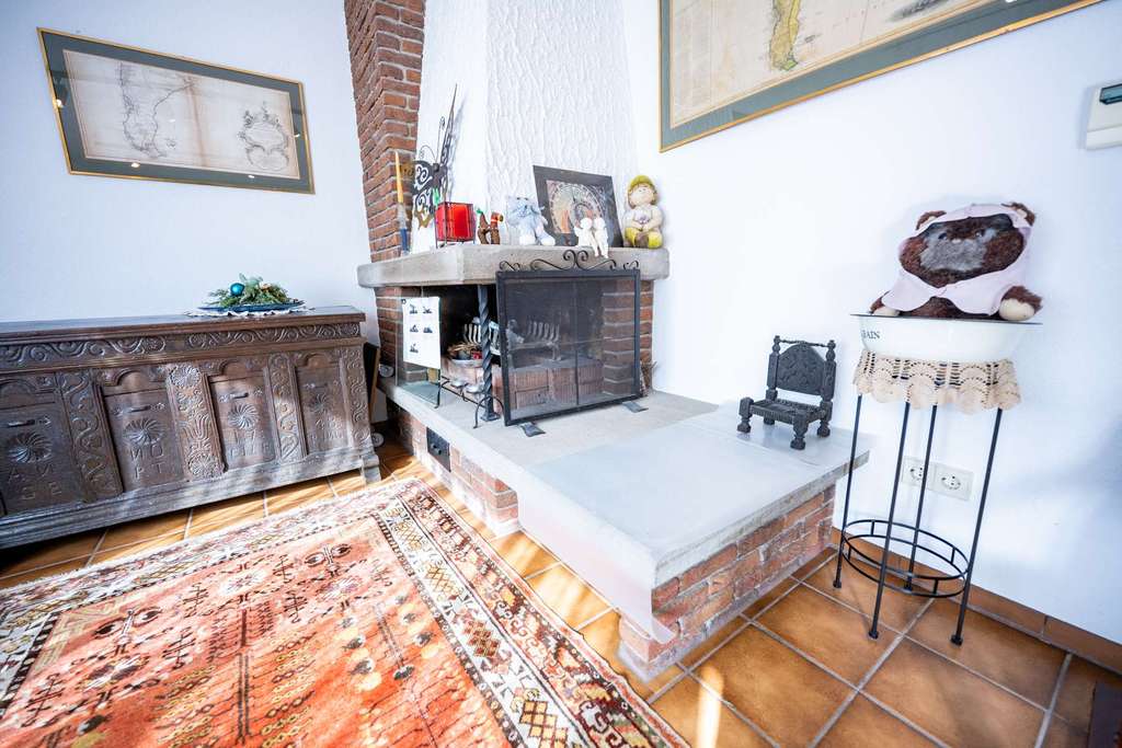 Immobilie in Wörrstadt - Wohnen wie im Haus: Gartenwohnung mit Kamin, Terrasse, großem Keller & Garage! Jetzt verlieben! - Bild 2