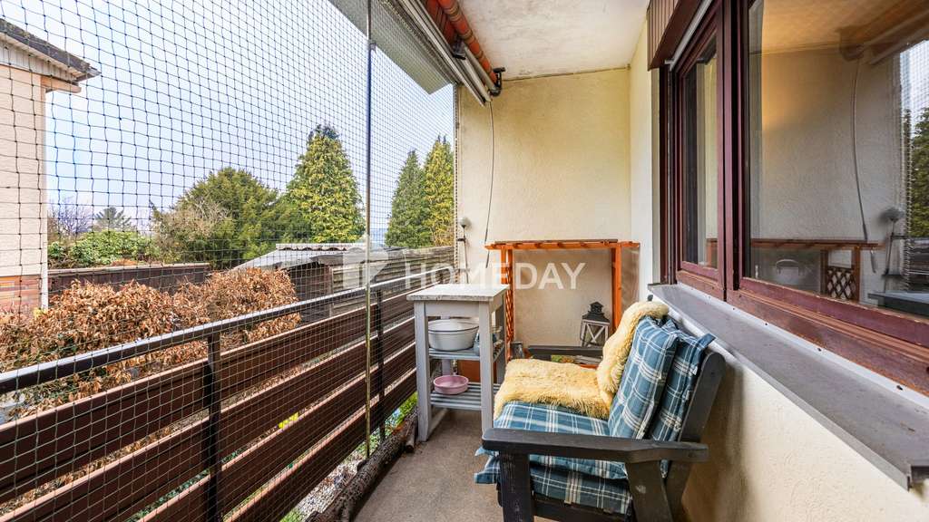 Immobilie in Hirzenhain - 2-Zimmer-Erdgeschosswohnung mit Südwestbalkon in ruhiger Lage von Hirzenhain - Bild 1