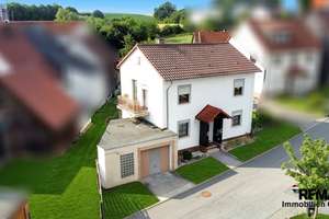 Gepflegtes Einfamilienhaus mit Terrasse, Gewölbekeller & Garage