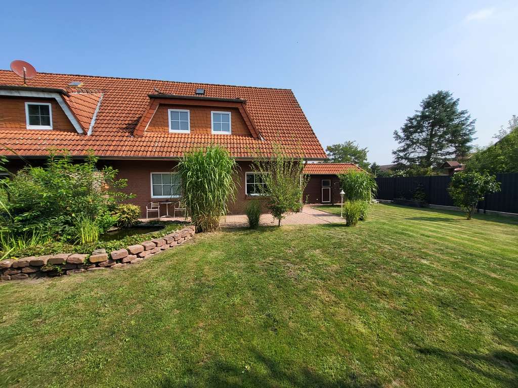 Immobilie in Müden (Aller) - Doppelhaushälfte mit Doppelcarport/Nebengebäude in ruhigem Wohngebiet - Bad und Heizung neu - Bild 1