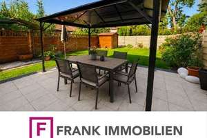 FRANK IMMOBILIEN - Ruhiges & familiäres Wohnen im Grünen! DHH mit Sonnenterrasse und Garten