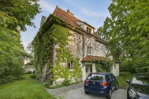 Mehrfamilienhaus mit Villencharakter auf großzügigem Grundstück in Garching