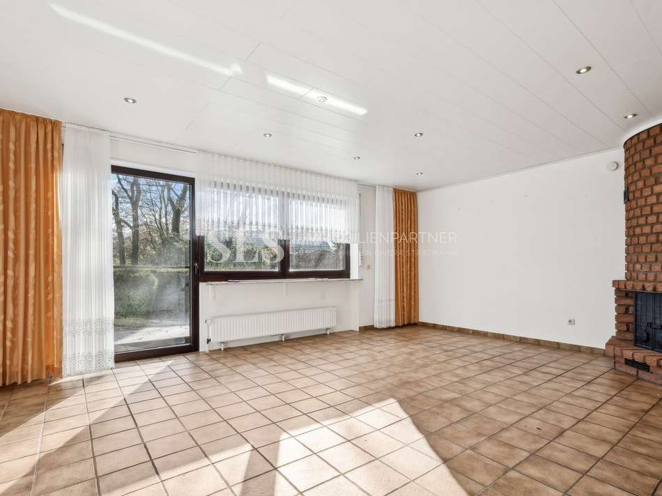 Wohnzimmer mit Kamin