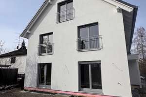 Neubau-Erstbezug Familienfreundliche Doppelhaushälfte mit eigenem Garten