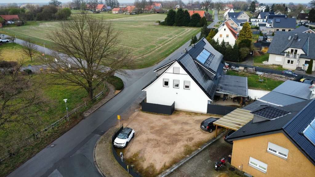 Immobilie in Espelkamp - Mehrfamilienhaus mit Rendite, Geschichte und moderner Technik – saniertes ehemaliges Schulgebäude - Bild 3