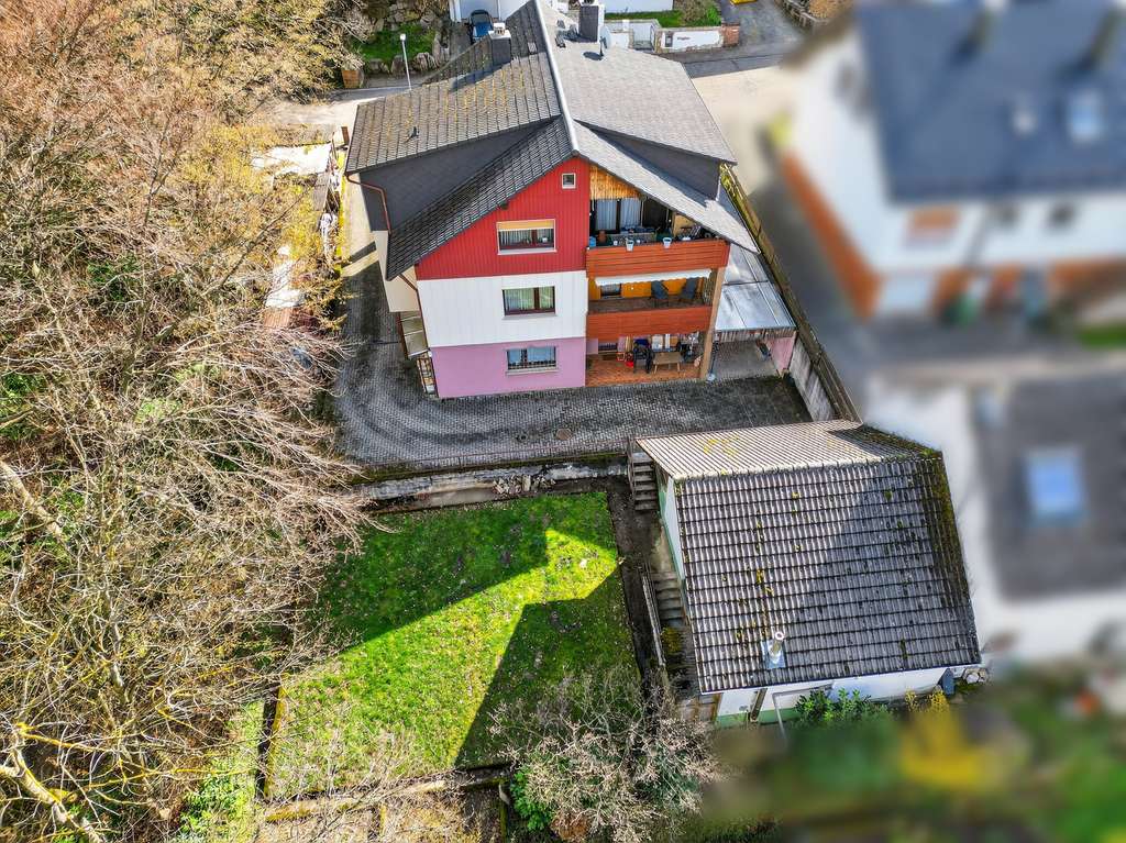 Immobilie in Malsch - Idyllisches Wohnen am Waldrand: Vielseitiges Mehrfamilienhaus auf 620 m² Grund - Bild 4