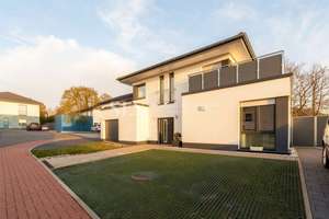 Architektur trifft Lebensqualität – Hochwertige Villa mit Einliegerwohnung und Wohnkeller