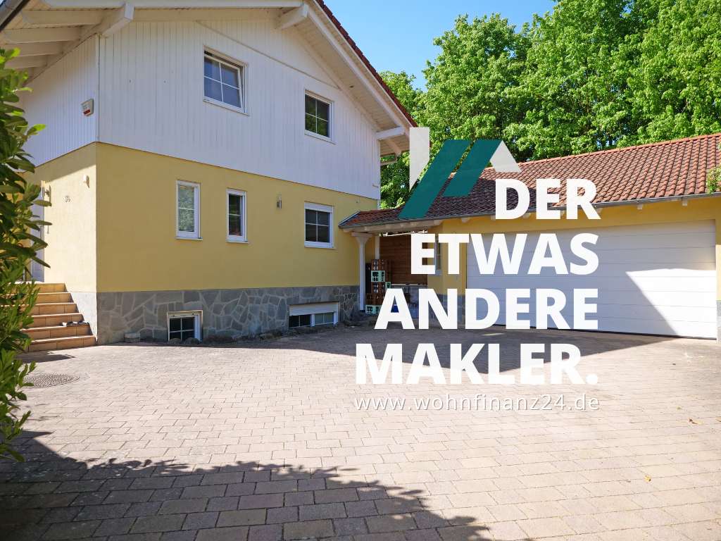 Immobilie in Wörrstadt - Wohnen. Wellness. Werkstatt. — Dieses Haus kann alles. - Bild 0