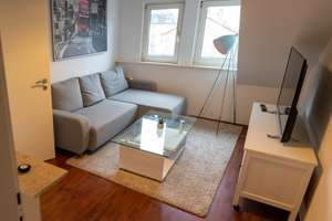 Upscale fully furnished apartment with EBK in prime location