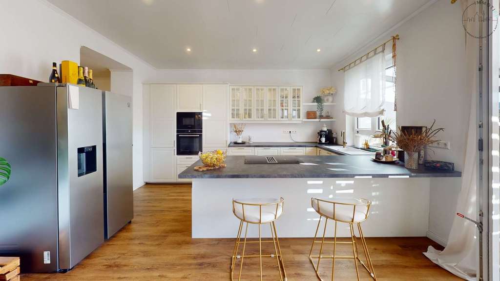 Immobilie in Kraichtal - Offen. Hell. Anders. – Sanierte EG-Wohnung mit außergewöhnlichem Wohnkonzept in Kraichtal-Menzingen - Bild 2