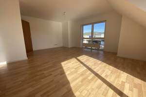 Helle 3-Zimmer-Maisonettewohnung mit Balkon und Tiefgarage in zentraler Lage