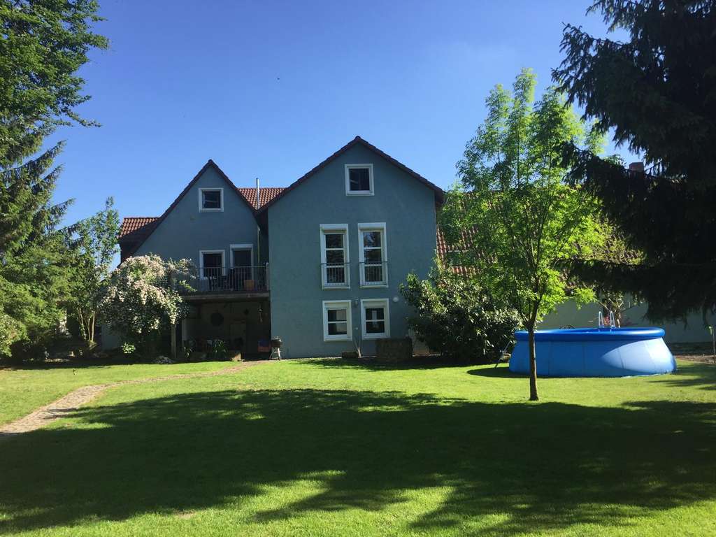 Immobilie in Wiesentheid - Mehrgenerationenanwesen mit 2 Wohnhäusern auf großzügigen Grundstück - Bild 2