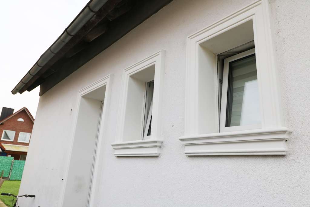 Immobilie in Quakenbrück - Modernisiertes, gepflegtes Zweifamilienhaus mit Keller, Garage und großem Garten - Bild 1