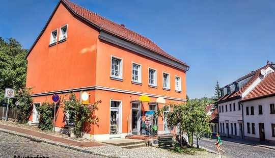 Bild von Wohn-/Geschäftshaus, Garagen und Außenstellplätze