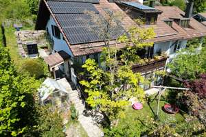 Wohntraum mit Weitblick: Exklusives Familiendomizil mit Einliegerwohnung in Ebersberger Hanglage