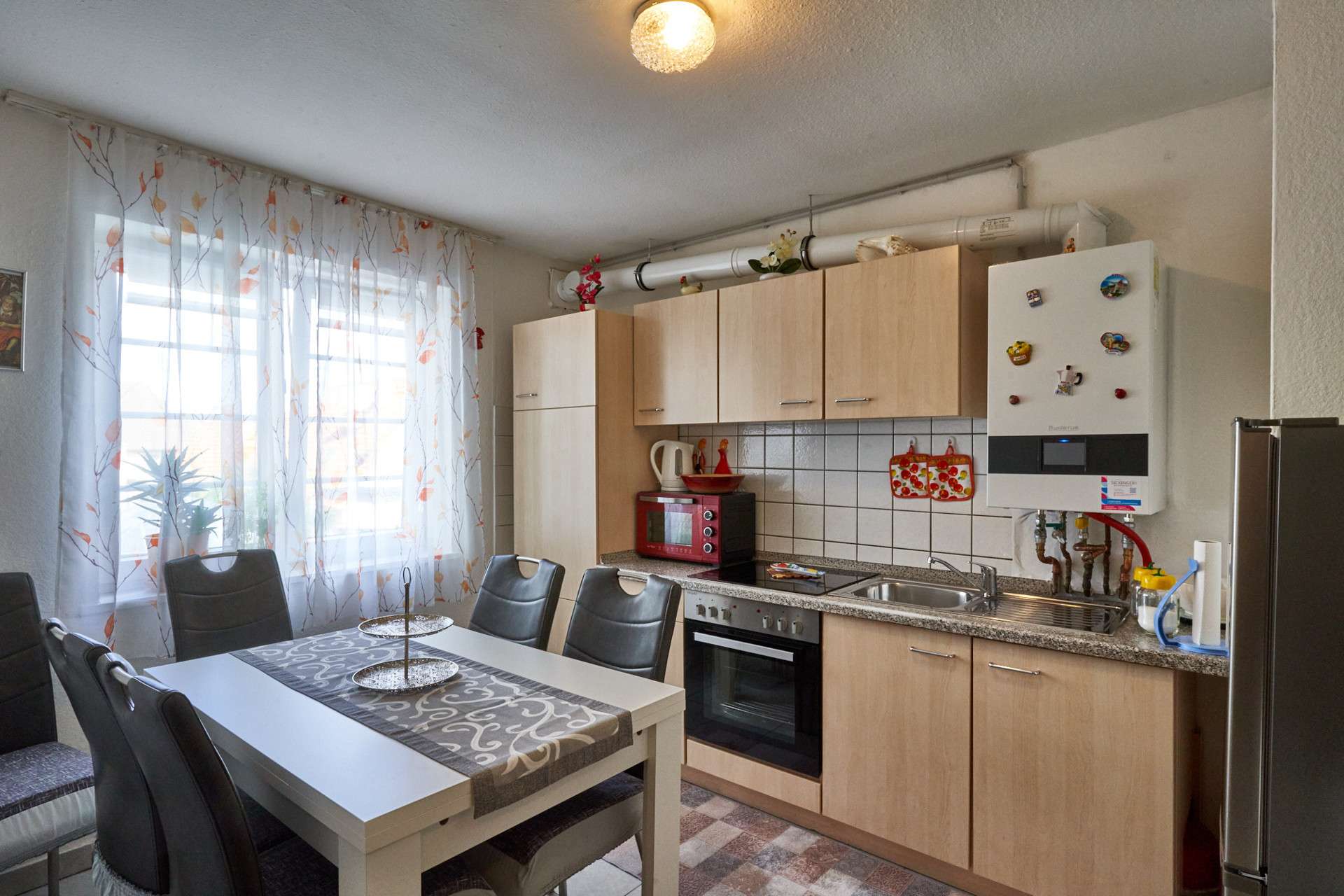 Immobilie in Hechingen - Freundliche Altbauwohnung in zentraler Lage – eine schöne Investitionsmöglichkeit - Bild 1