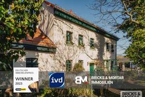 Exklusive Wohn- und Gewerbeimmobilie in denkmalgeschütztem Ambiente mit Garten