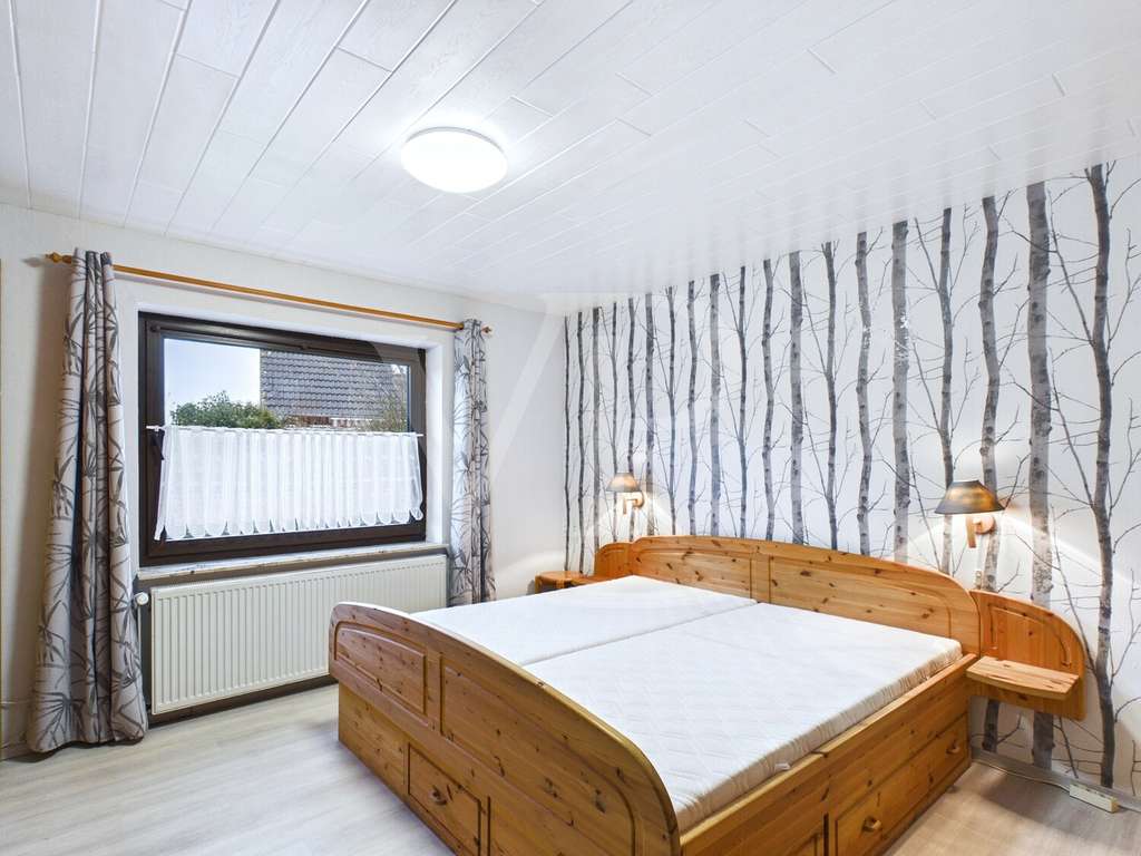 Immobilie in Esens - Familienfreundliches Wohnen in begehrter Lage in Esens -  Einfamilienhaus mit großem Grundstück - Bild 2