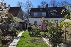 Einladende Doppelhaushälfte mit liebevoll angelegtem Garten in Kley!