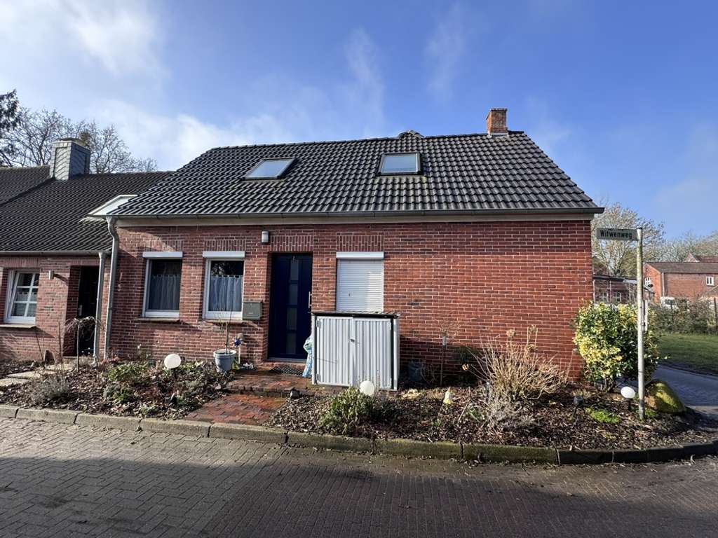 Immobilie in Hinte - Liebevoll modernisiertes Kleinod mit Wintergarten, Nebengebäude und Garagen - Bild 2