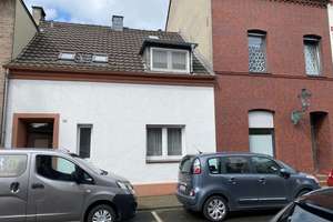 Heerdt wohnen und vermieten am Rhein Einfamilien- und Appartementhaus