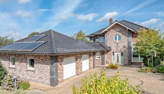 Bild von Einfamilienhaus mit Einliegerwohnung und Bürotrakt – ideal für Wohnen und Arbeiten (Homeoffice)