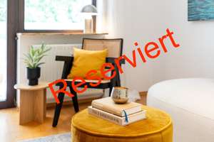 Lichtdurchflutete 2-Zimmer-Wohnung mit Südbalkon, traumhaftem Blick ins Grüne, Aufzug und Tiefgarage