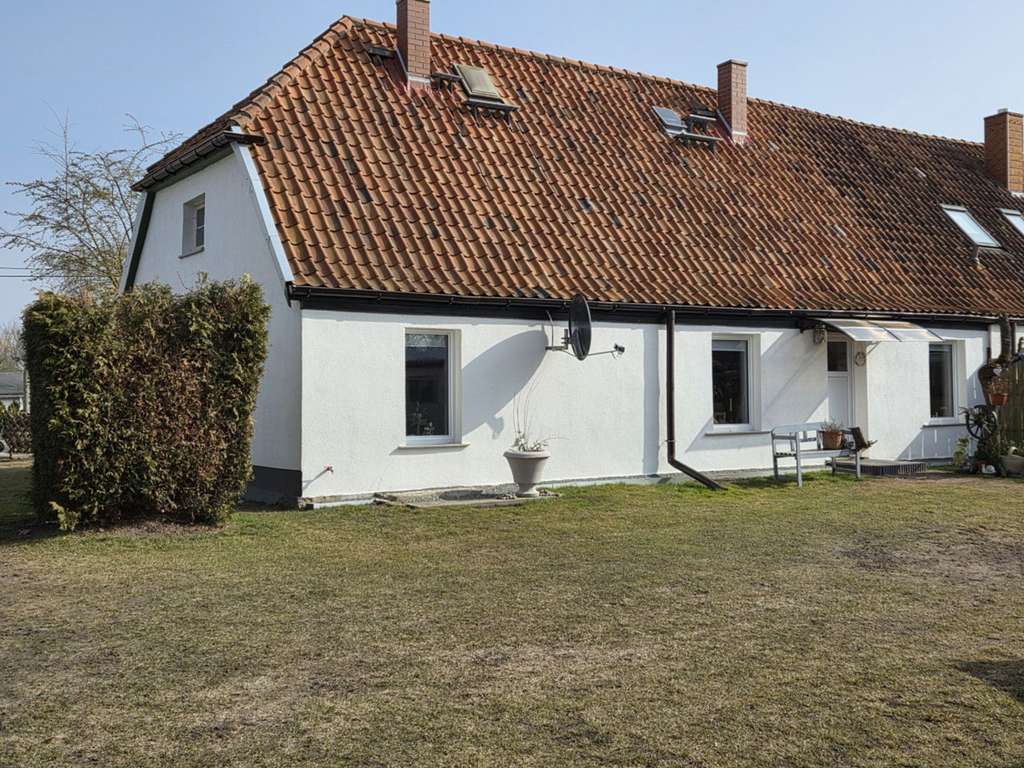 Immobilie in Altenpleen - Einmaliges Grundstück mit schöner und kuscheliger  DHH - Blick auf den Bodden - Bild 1