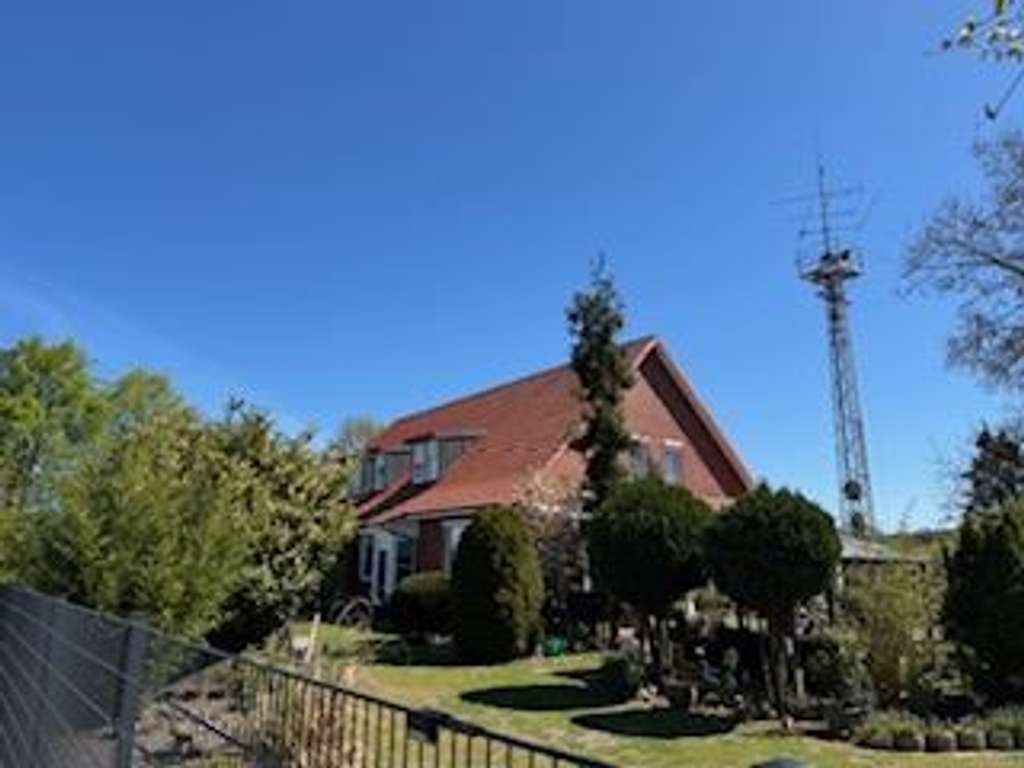 Immobilie in Weyhe - Landhaus mit 2 Wohneinheiten und Gewerbeteil, mit 5000 m² Grundstück - Bild 4