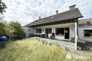 Erdgeschosswohnung mit Terrasse und Garten in einem Zweifamilienhaus