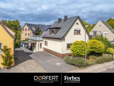 Familienhaus mit Einliegerwohnung & Pool