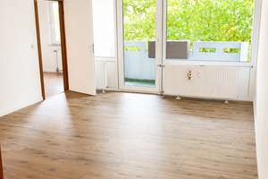 Zentral Wohnen mit schönem Blick ins Umland - teilmodernisierte 2 Zimmer ETW mit TG-Platz