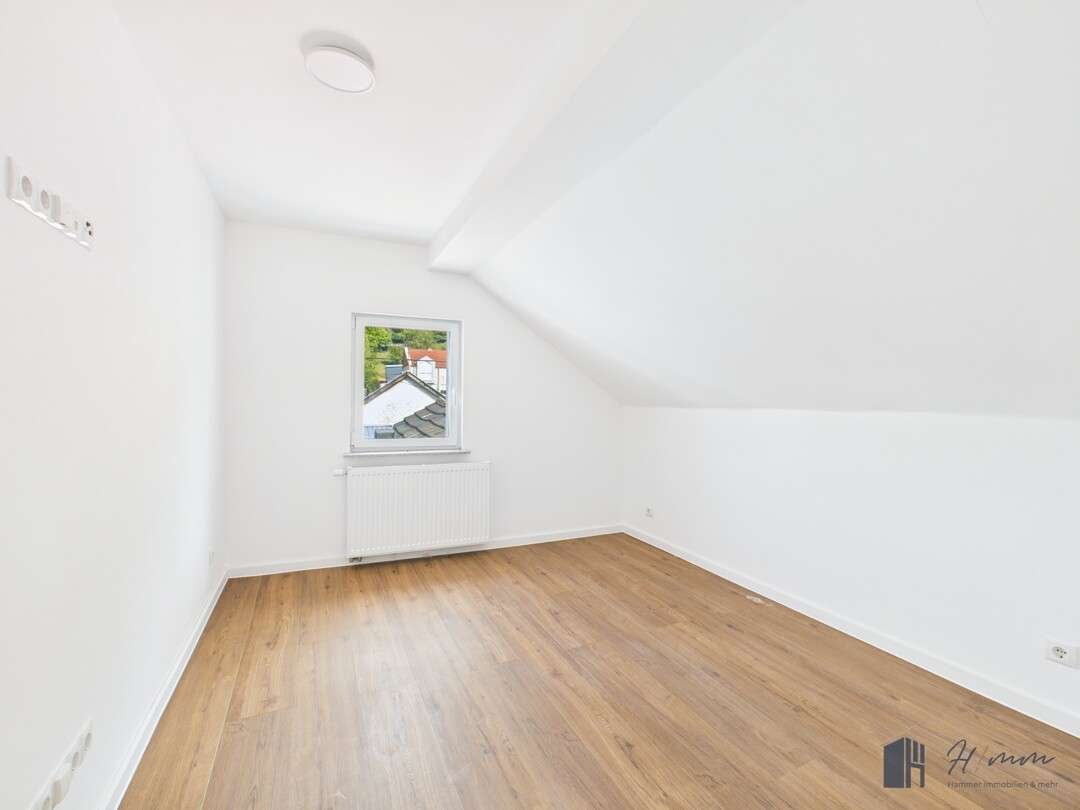 Immobilie in Rheinbrohl - Modernisiertes Reihenhaus in Rheinbrohl – Wohnen mit Rheinblick und Familienkomfort! - Bild 6